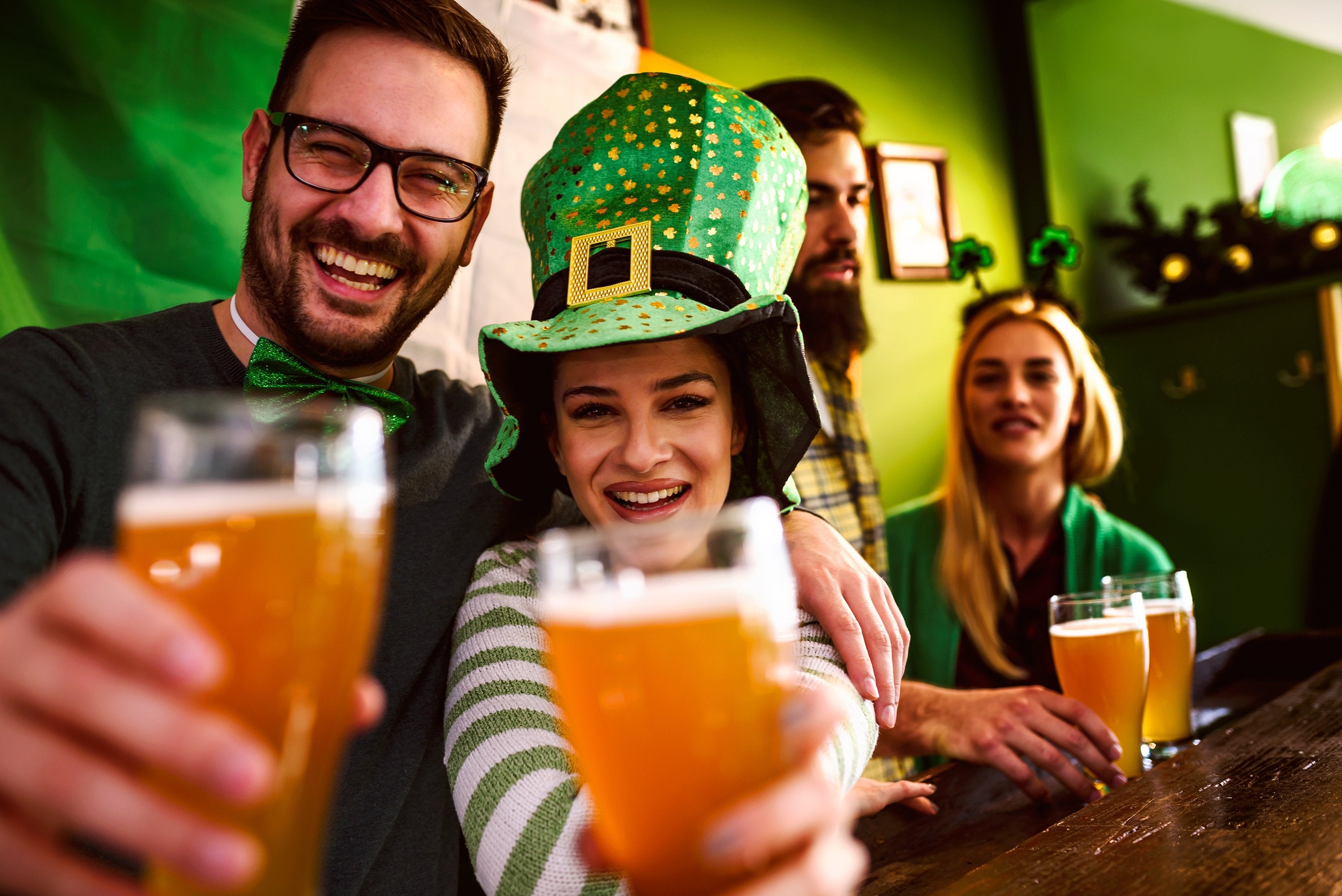 St, Patrick's Day celebrants enjoying beer in a pub
